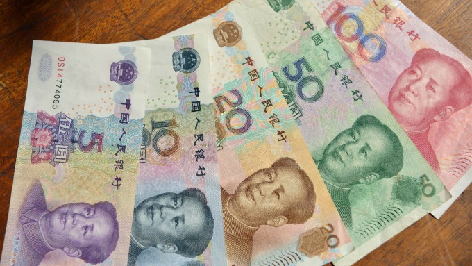 Fed鷹派立場助美元指數拖累離岸人民幣貶破6.74大關