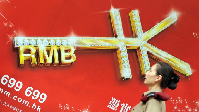 人民幣如坐云霄飛車早盤狂瀉午后大行進場拉回