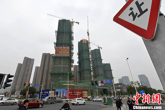 1月10日，福州一處商品房在建中。 <a target='_blank' href='http://www.chinanews.com/' _fcksavedurl='http://www.chinanews.com/'></p></table>中新社</a><p>　　記者 呂明 攝